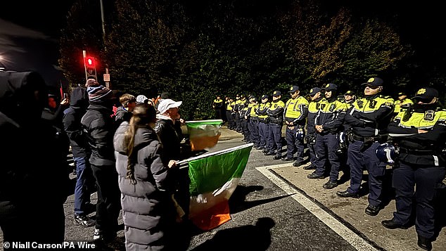 Officers (pictured on October 22) also had horses of their own, a helicopter and the force's two brand new water cannon vehicles, recently purchased for £1.3 million