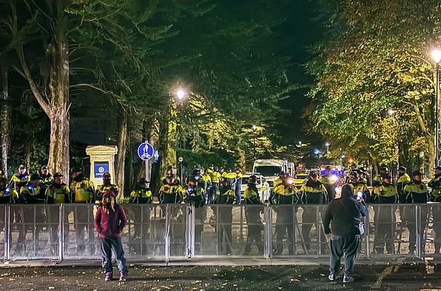 Gardai (pictured on October 23) were initially ill-prepared for the attacks they would be on the end of - including having fireworks thrown at them
