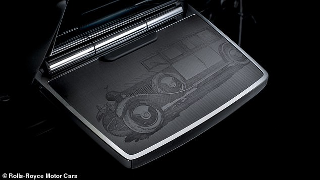 Depictions of the original 1925 Phantom I and the current Phantom VIII are individually etched on the rear picnic tables and the models are mirrored in embroidery on the tables' leather-finished backs