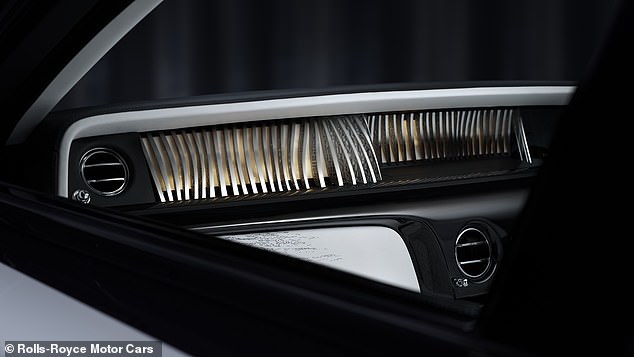 Spanning the dashboard is this sculpted row of 50 3D-printed aluminium sheets - resembling pages in a book as the reader leafs through them