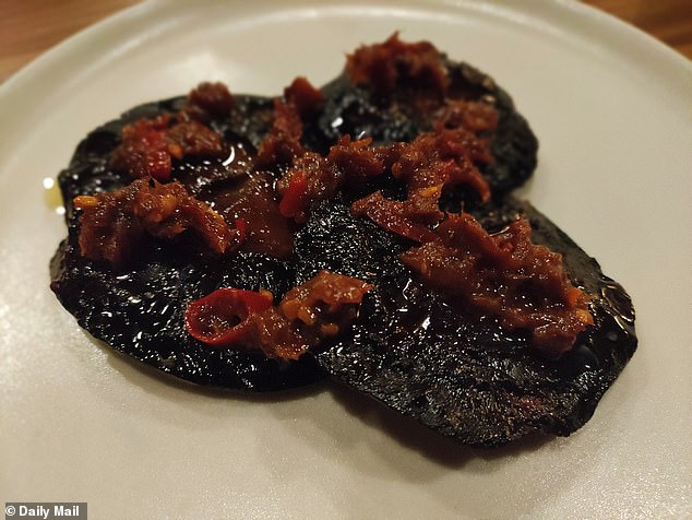 A dinner begins with mushrooms dried earlier that day on the back porch, infused with fermented soybeans (called natto) and drizzled with spicy xo seafood sauce