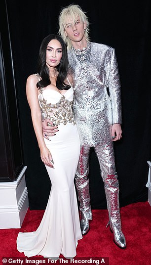 'We go back and forth on who she looks like,' MGK explained to Hudson. 'Last month, she looked exactly like me and now she looks exactly like her'; seen in 2023 in L.A.