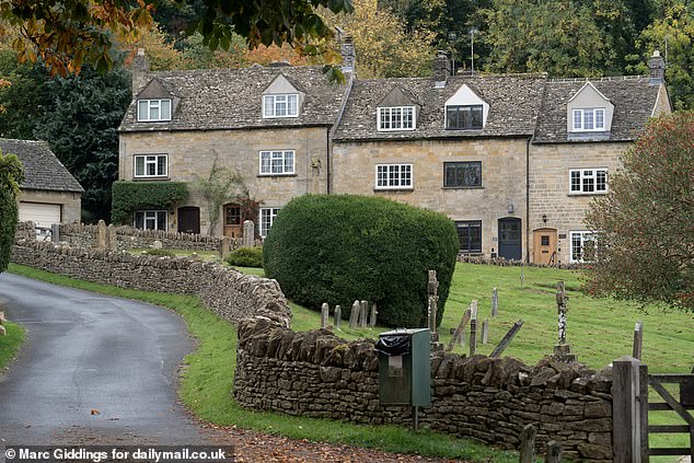 Locals say new planning rules restricting people from painting their front doors without permission have been pushed through by a small group of 'busy bodies' in Snowshill