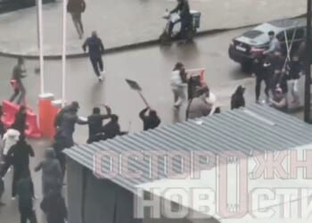 Shocking moment ‘migrant mob’ armed with shovels and iron bars rampages through streets in Putin’s capital Moscow