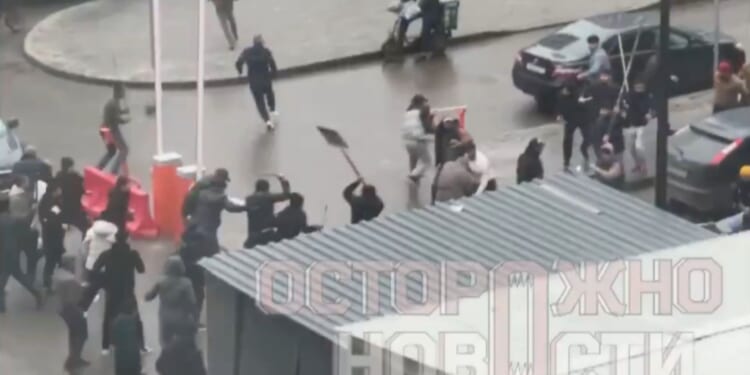 Shocking moment ‘migrant mob’ armed with shovels and iron bars rampages through streets in Putin’s capital Moscow