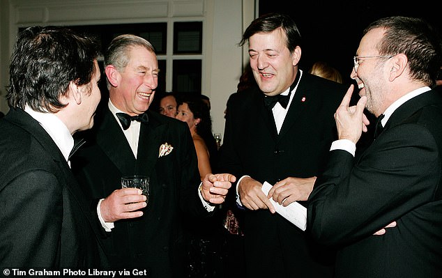 Charles laughs with Jools Holland, Stephen Fry and Eric Clapton at an event in London in 2005