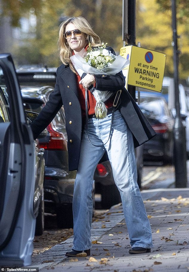 The newly-single This Morning presenter appeared radiant and glowing as she carried a huge bouquet of flowers to gift to her designer pal Charlie Brear