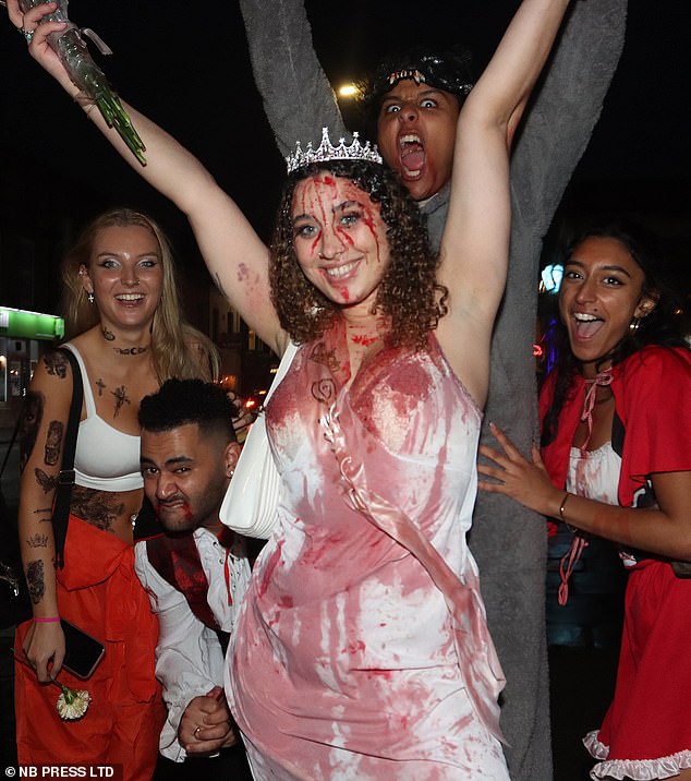 2022 - A group of friends dressed as a prison inmate, pirate, corpse bride, werewolf and Little Red Riding Hood are spotted in Leeds