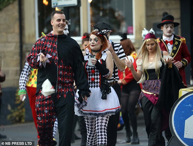 Others chose circus themed costumes as they dressed up for the spooky celebrations, even donning face paint and hair accessories