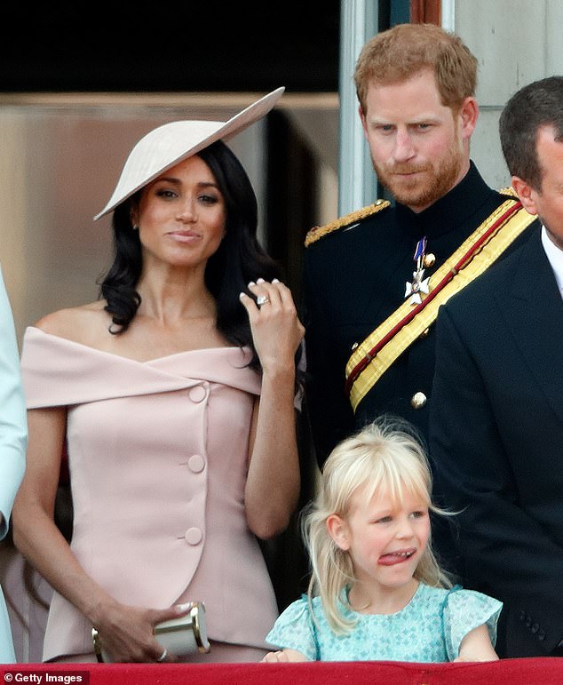 Unafraid of departing from Royal fashion protocol, when the Duchess made her debut at Trooping the Colour earlier that year, she arrived in an off-the-shoulder Carolina Herrera dress in a soft blush pink shade with a matching Philip Treacy hat