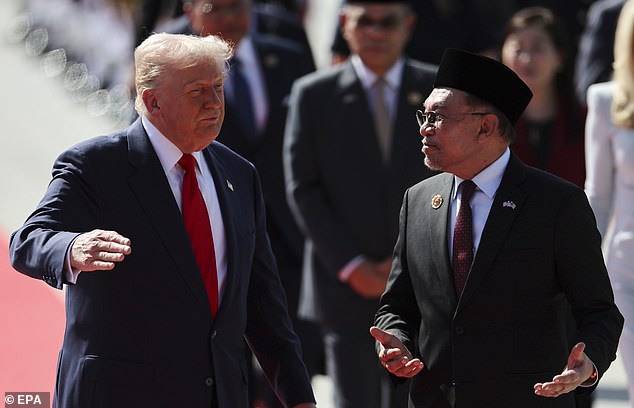 Malaysian Prime Minister Anwar Ibrahim walked alongside Trump as he was given a warm introduction to the Southeast Asian nation