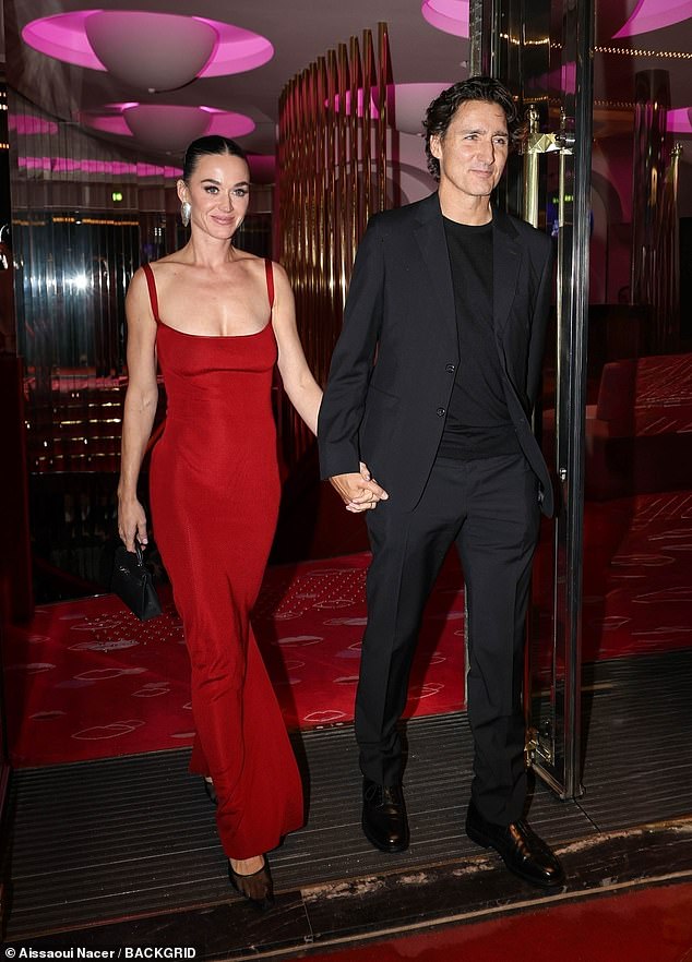 The couple looked loved-up as they arrived at the Crazy Horse in Paris, France celebrating the pop star's 41st birthday