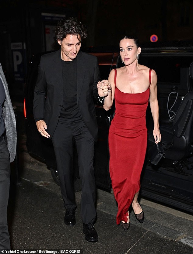 She toted her belongings in a small black Birkin handbag