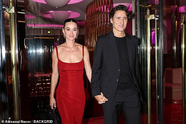 The California Girls hitmaker flashed her gorgeous smile as she officially debuted her romance with Justin outside the venue