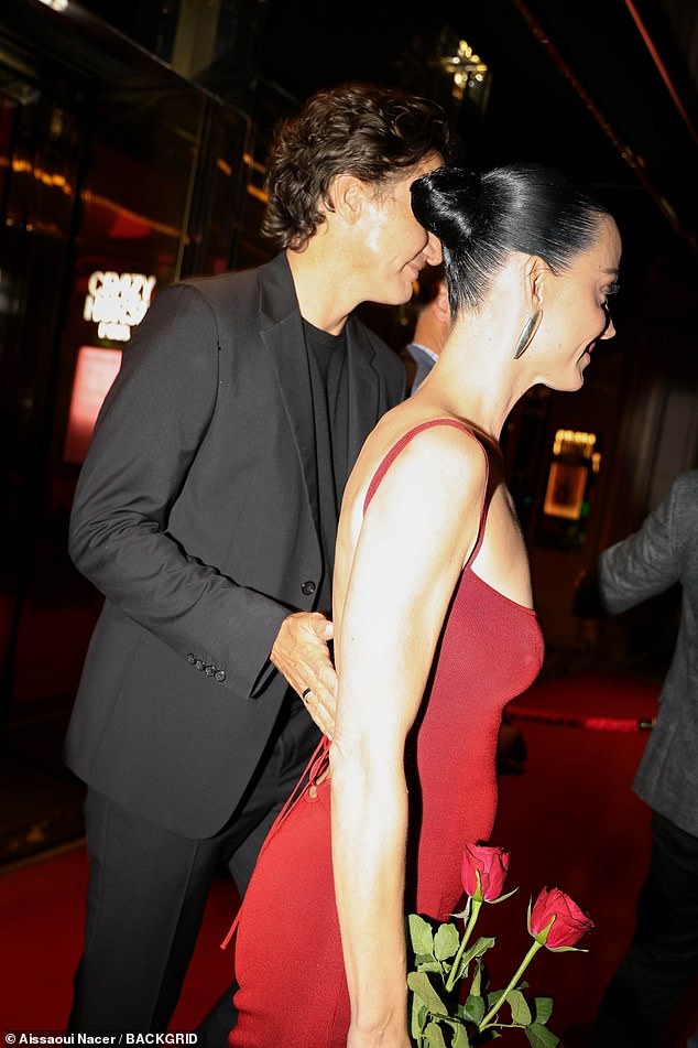 The pop singer looked sensational in the backless dress