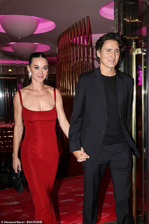 The pair beamed as they walked hand-in-hand