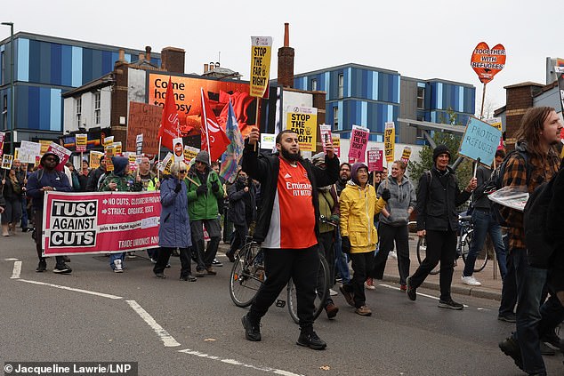 Counter protesters block a road in Southampton as local residents hold an anti-immigration protest outside