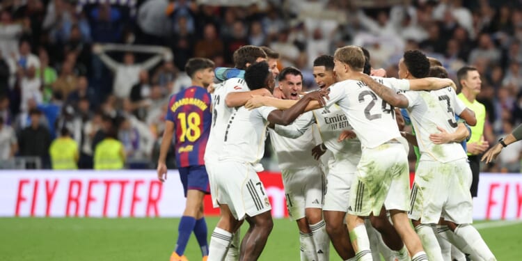 Huge brawl breaks out between Real Madrid and Barcelona after red card as benches get involved in ugly end to El Clasico