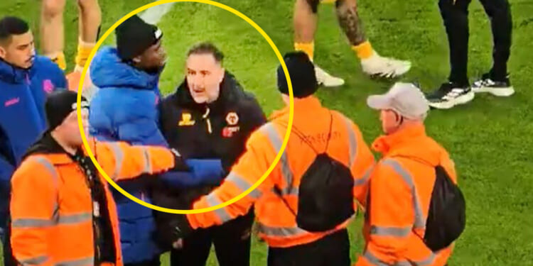 Under-fire Wolves boss Vitor Pereira has to be restrained during angry confrontation with fans as team booed off pitch