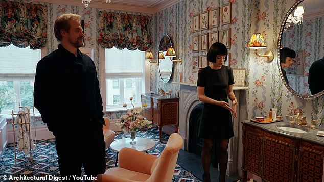 While opening the door David jokes about the camera crew being an old lover and asked: 'What the hell are you doing here? I have a family now' before inviting them in, while Lily giggled