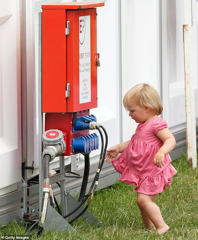 In 2015, when the eldest Tindall was only one year old, her mother had her hands full with the adventurous toddler at the Festival of British Eventing, when she wandered over to an electric generator (pictured)