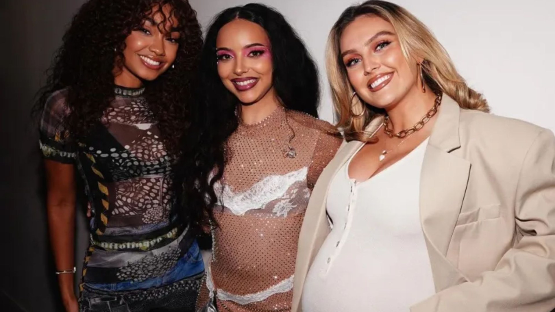 Little Mix send fans wild with surprise reunion as Perrie Edwards shows off huge baby bump