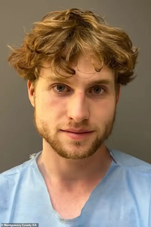 In his mugshot, the student is seen bleary-eyed with a smile on his face. He was denied bond