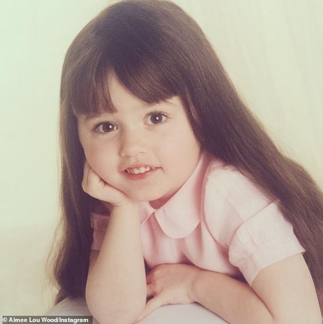Remembering an incident when Aimee-Lou (pictured as a youngster) was just a toddler and her mother was heavily pregnant with Emily, he said he had gone to a pub in Manchester to drown his sorrows - and Mick had to drag him out