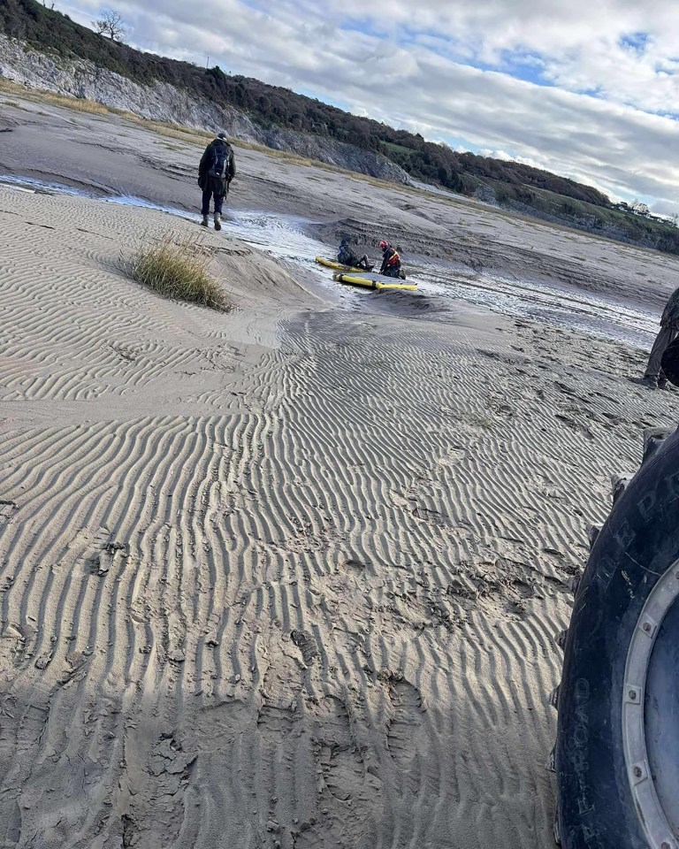 Emergency rescue vehicle on sandy terrain at Morecombe Bay.