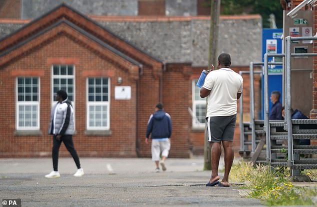 From the very highest levels of the Civil Service, there was a lack of rigour in drawing up crucial contracts for asylum accommodation. Pictured: Some of the more than 300 asylum seekers at Napier Barracks in Folkestone, Kent