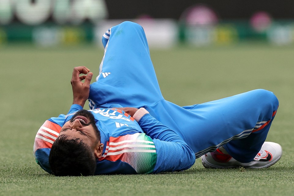 India's Shreyas Iyer on the ground after an attempt to catch Australia's Alex Carey.