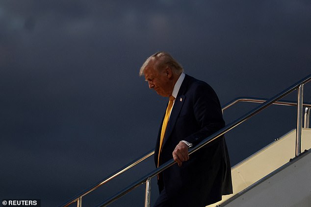 President Donald Trump disembarks Air Force One in Tokyo, Japan Monday evening