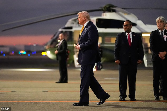 President Donald Trump makes his way to Marine One after arriving Monday evening in Tokyo. He'll fly to the Imperial Palace to meet with the Emperor of Japan