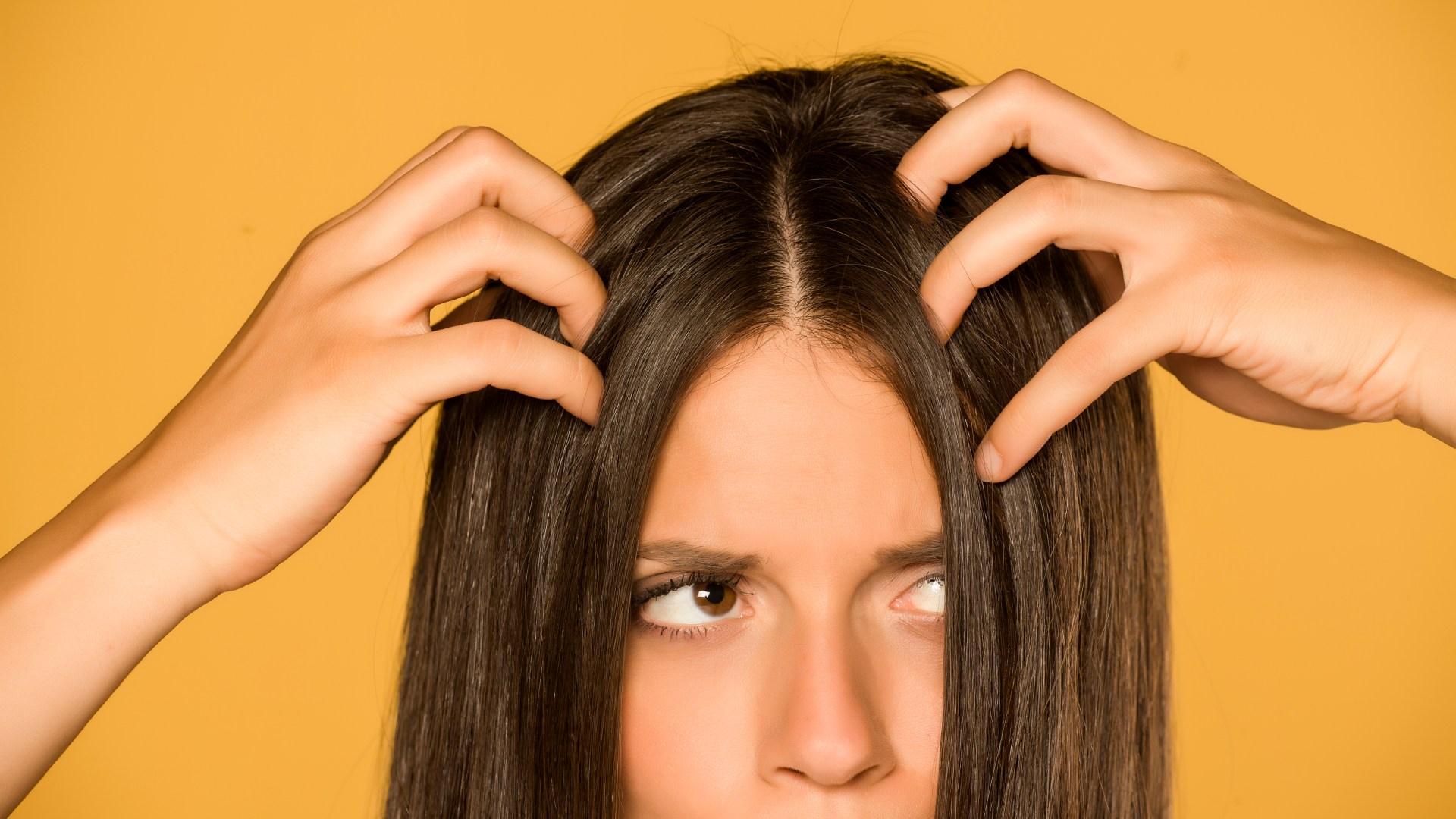 Can you really 'train' your hair to be less greasy? Expert busts the popular myth & four other hair truths