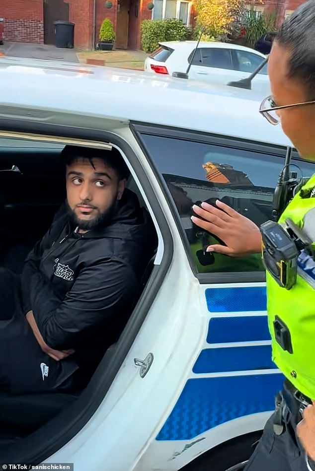 The video shows the PC grinning while the owner sits in the back of her car after a joke 'arrest'