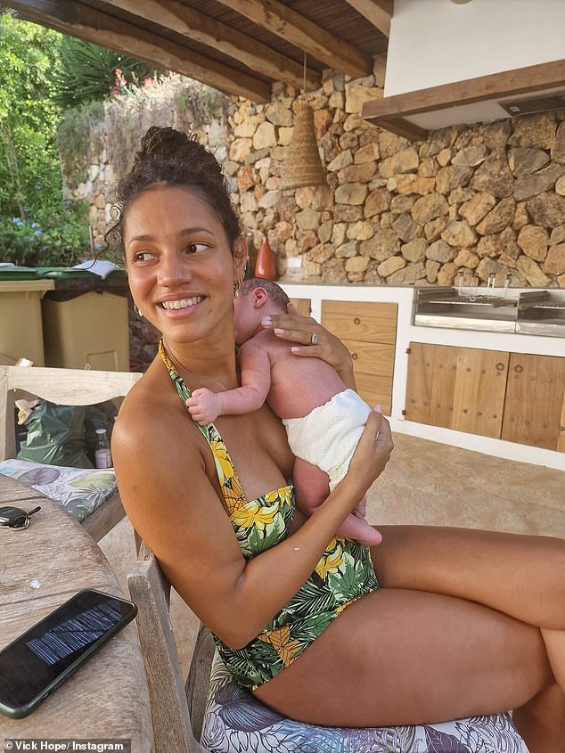 The presenter, 36, looked incredible in a green and yellow halterneck swimsuit as she spent quality time with her 3-month-old bundle of joy