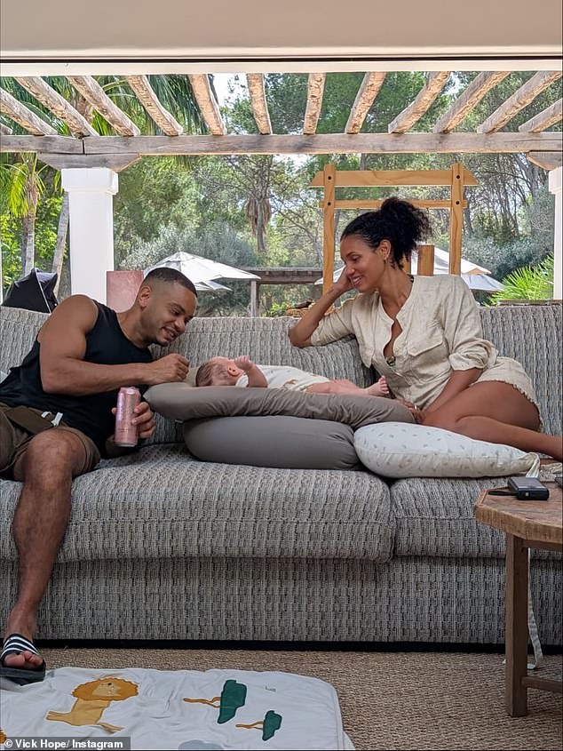 In another snap, the star looked happier than ever as she lay on the sofa with her little boy