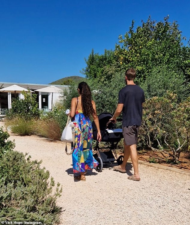 Meanwhile another photo showed her and husband Calvin enjoying a walk with Micah