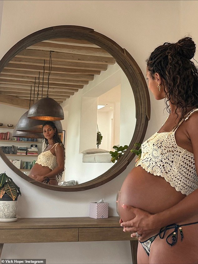 Reflecting on the year, Vick also shared a series of stunning bump snaps from her pregnancy as she posed in a bikini cradling her bump