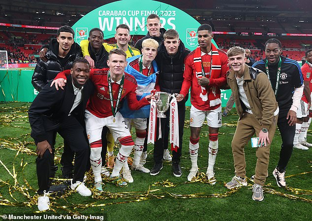 Bennett pictured (centre) with team-mates including Scott McTominay, Alejandro Garnacho and Marcus Rashford following Manchester United's Carabao Cup final win in 2023