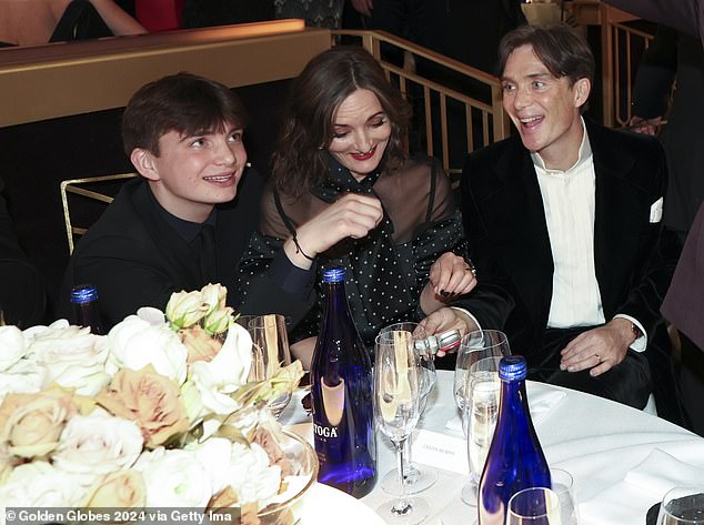Aran, 17, has joined the cast of WAR, the upcoming HBO and Sky co-production, following in Oscar winner Cillian's footsteps (pictured with his mum Yvonne McGuinness and Cillian at the 2024 Global Globes)