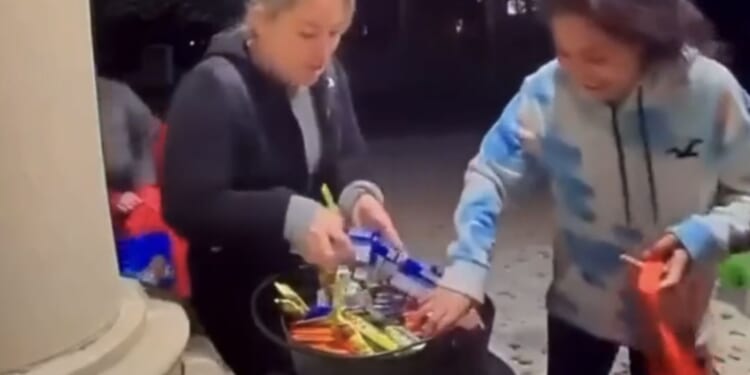 Shameless parents raid and empty trick or treat bucket leaving other children heartbroken