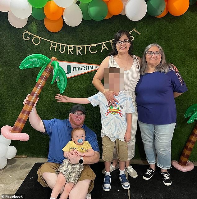 Julian and Wood were rushed to St John Medical Center but Julian died from the flurry of stab wounds to his back and cheek. His mother's injuries were not life-threatening