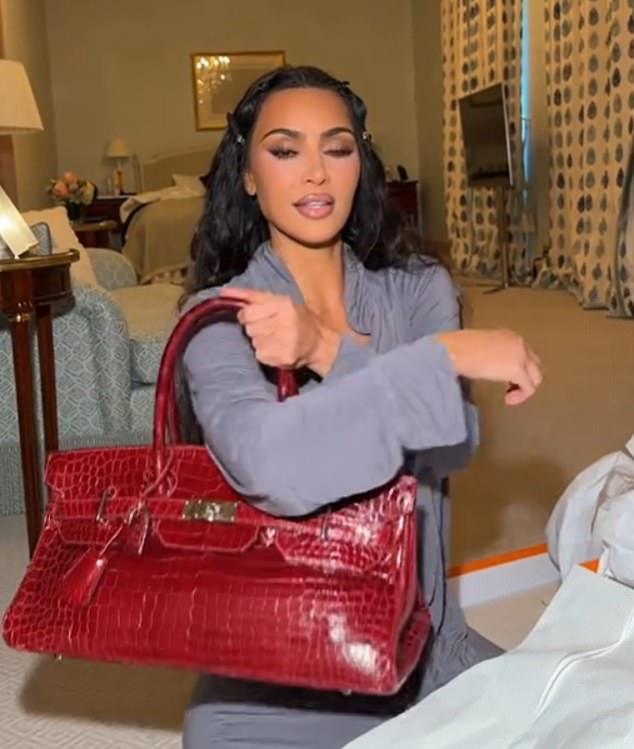 One purse was a red crocodile short Hermes Birkin bag from 2001 that was designed by Jean Paul Gaultier; it is estimated to be worth between $150K and $200K. The All's Fair actress explained that this purse had been on her wish list but she was too busy with law school studies to snap it up so someone else bought it