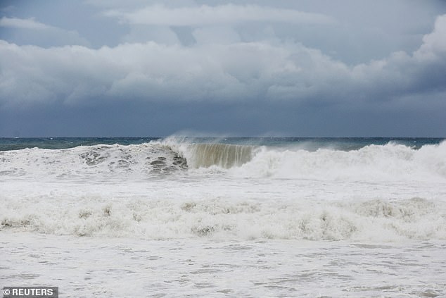 The slow-moving storm has killed at least three people in Haiti and a fourth person in the Dominican Republic, where another person remains missing