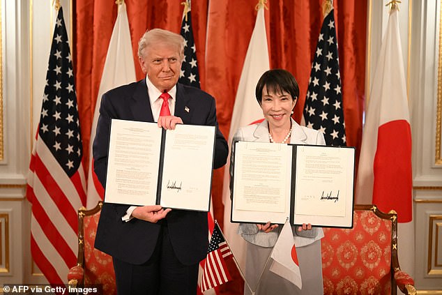 President Donald Trump (left) attends a signing ceremony with Japanese Prime Minister Sanae Takaichi (right) at the Akasaka Palace Tuesday morning in Tokyo