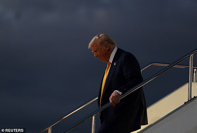 President Donald Trump disembarks Air Force One in Tokyo, Japan Monday evening
