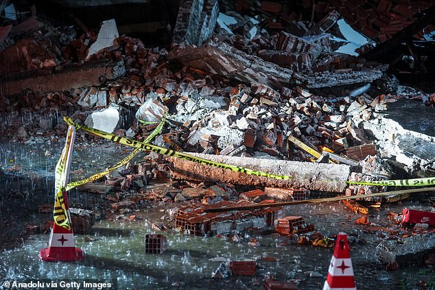 The aftermath of one of the buildings that collapsed left as rubble after a 6.1 magnitude earthquake struck the Sindirgi