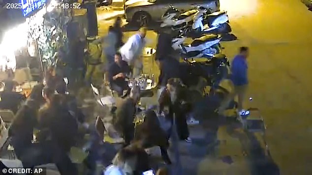 Dramatic CCTV footage shows residents running for cover while dining out