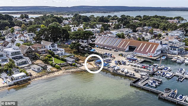 The fence is circled. Residents have now instructed lawyers to take legal action following the row